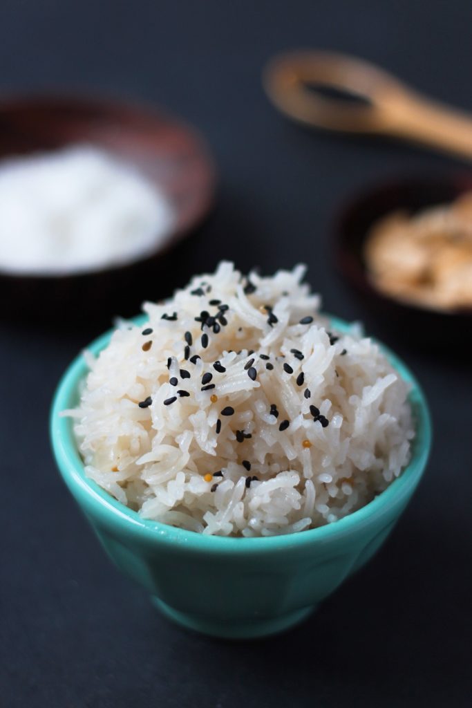 The Best Coconut Rice. This recipe is indulgent and creamy from coconut milk yet spicy and balanced from cinnamon, jalapeno and mustard seeds. #Vegan and #GlutenFree, too!