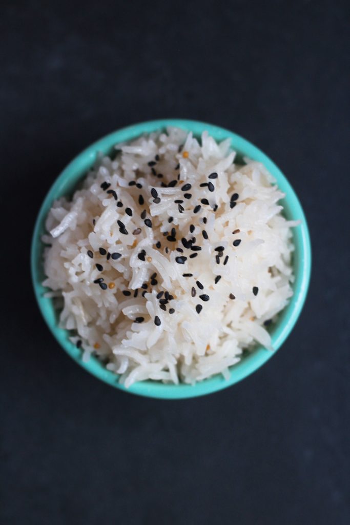 The Best Coconut Rice. This recipe is indulgent and creamy from coconut milk yet spicy and balanced from cinnamon, jalapeno and mustard seeds. #Vegan and #GlutenFree, too!