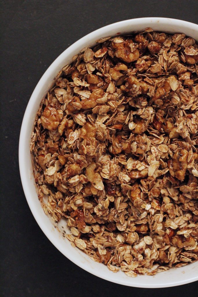 Roasted Walnut Maple Granola: A deeply flavorful and crunchy breakfast granola made from roasted walnut oil, maple syrup and lots of cinnamon. Vegan and Gluten Free.