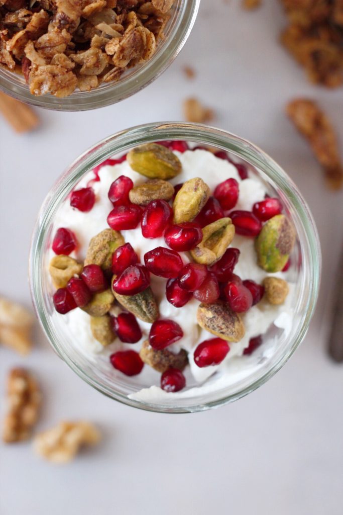  An easy, 5 minute holiday parfait recipe, featuring pistachio, pomegranate and nutty granola that is sure to brighten your day. #GlutenFree and #Vegan options!