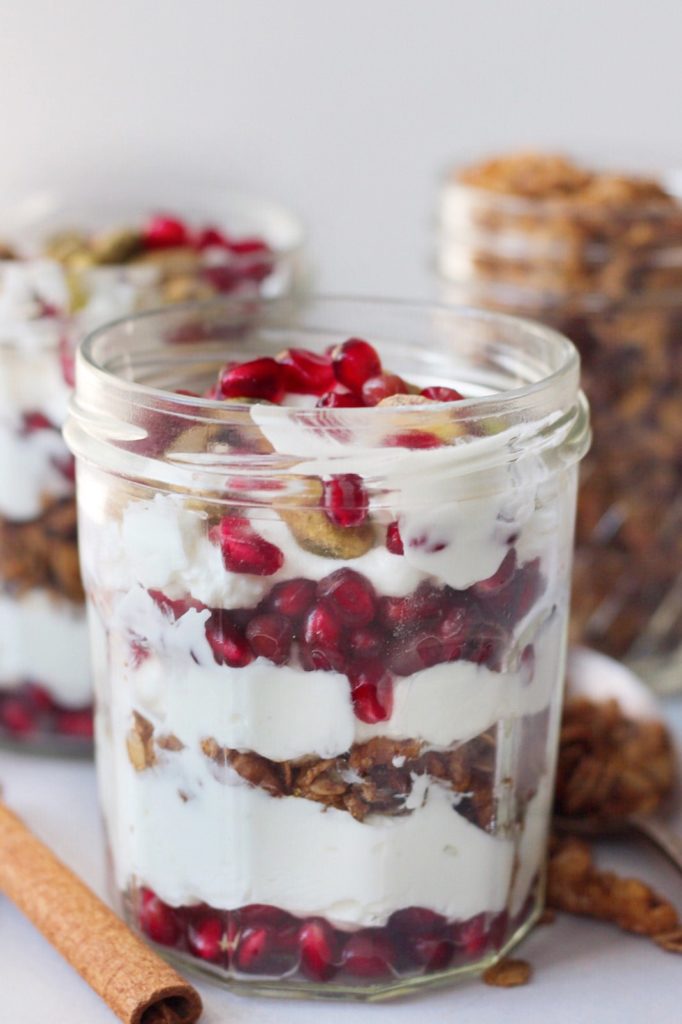  An easy, 5 minute holiday parfait recipe, featuring pistachio, pomegranate and nutty granola that is sure to brighten your day. #GlutenFree and #Vegan options!