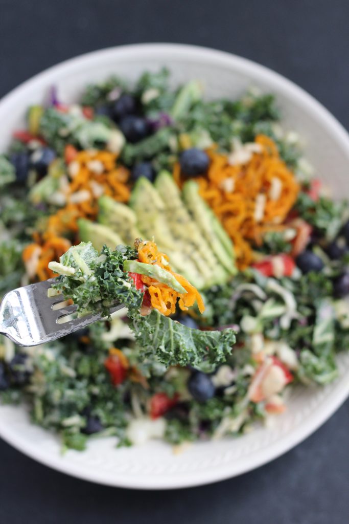 A simple kale and raw veggie salad with a creamy maple tahini dressing. Vegan, gluten free and flexible for ingredients you have on hand!